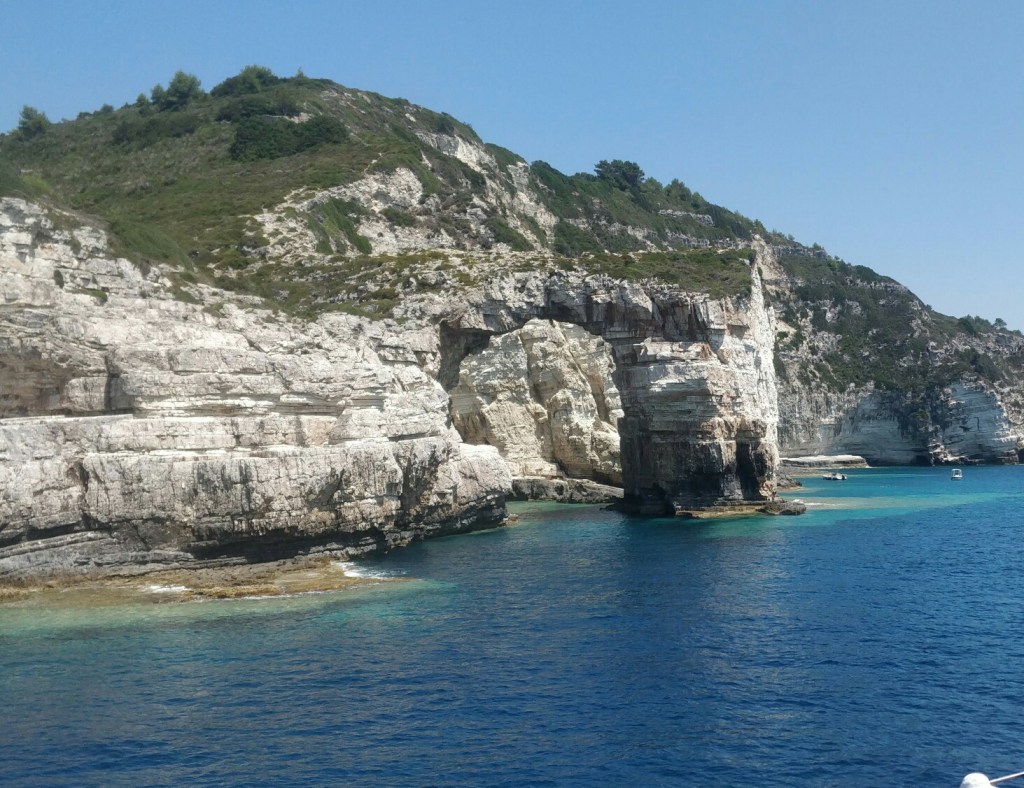 photo of a natural rocky arch called kamara on the island of Paxoi in the Ionian sea in Western Greece - a natural rock formation